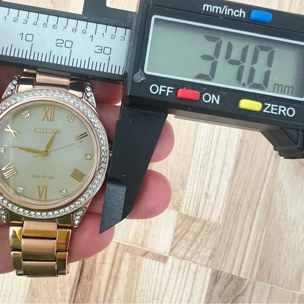 Citizen eco-drive ladies rose gold tone solar dress watch